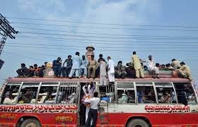 Two passengers sitting on a bus roof die from electrocution